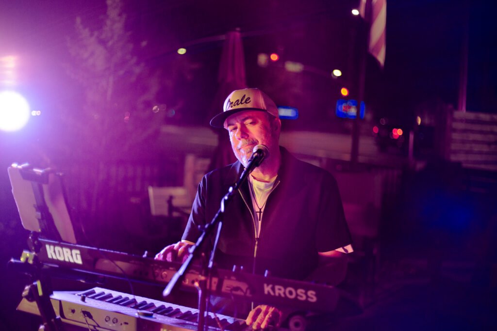Sal playing keyboards with Órale Band live at Maddies in Boise, Idaho