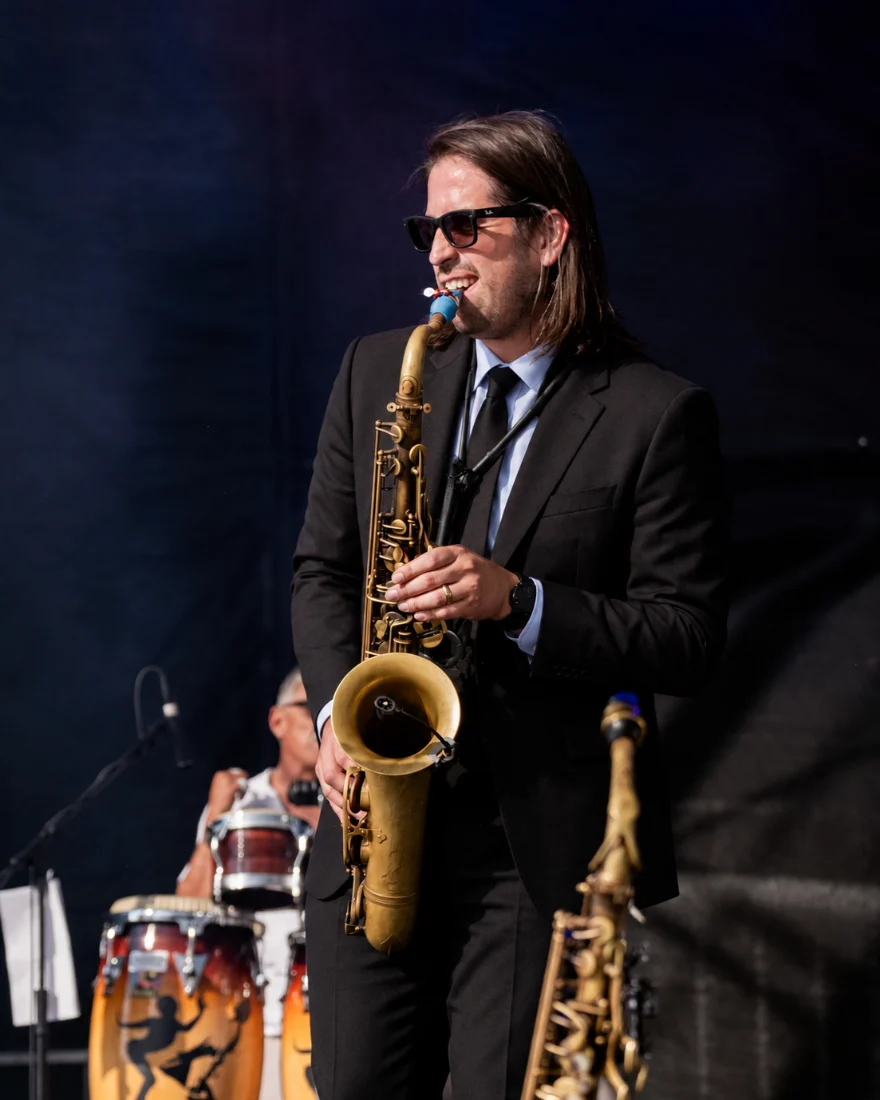 Josh of Órale Band performing live