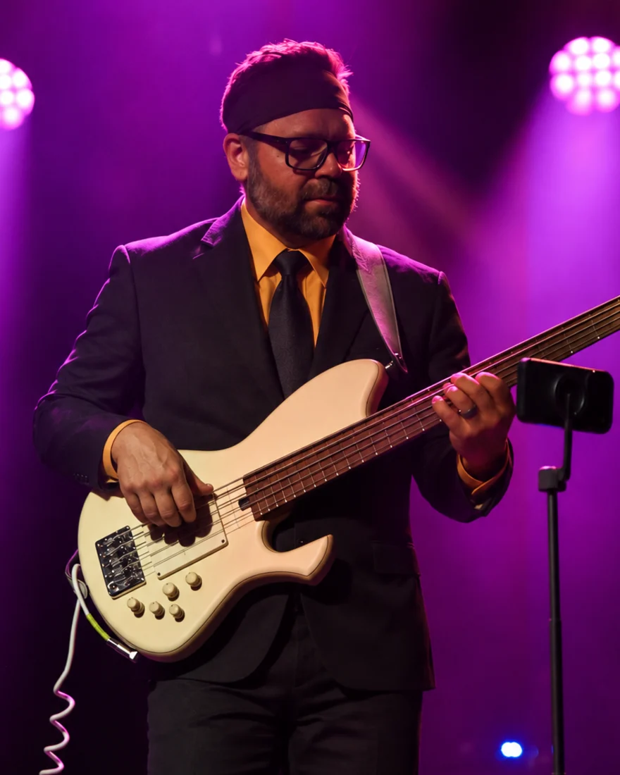 Tyler of Órale Band performing live